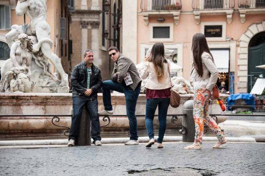 Ask young beautiful girls to take your picture.